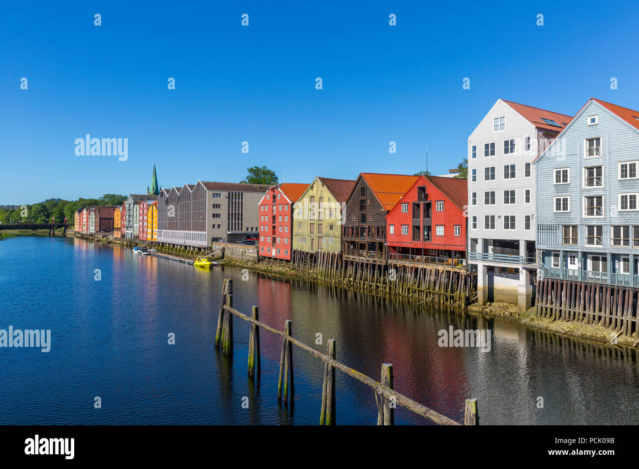 Colorful old storehouses along the river Nidelva in Trondheim Stock Photo