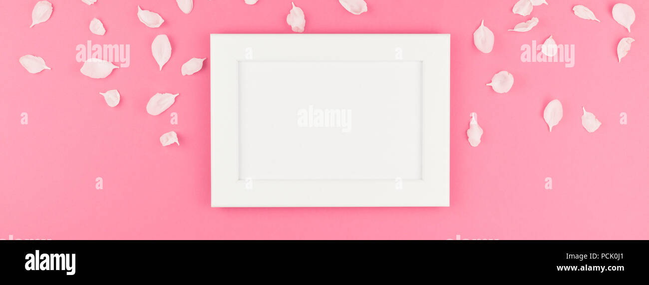Creative flat lay concept top view of white frame mock up and apple ...