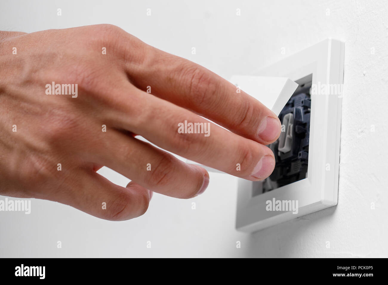 electrician installing light switch Stock Photo Alamy