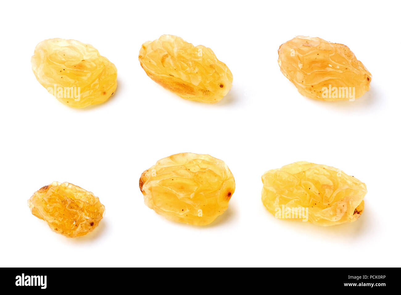 Closeup golden raisin isolated Cut Out Stock Images & Pictures - Alamy