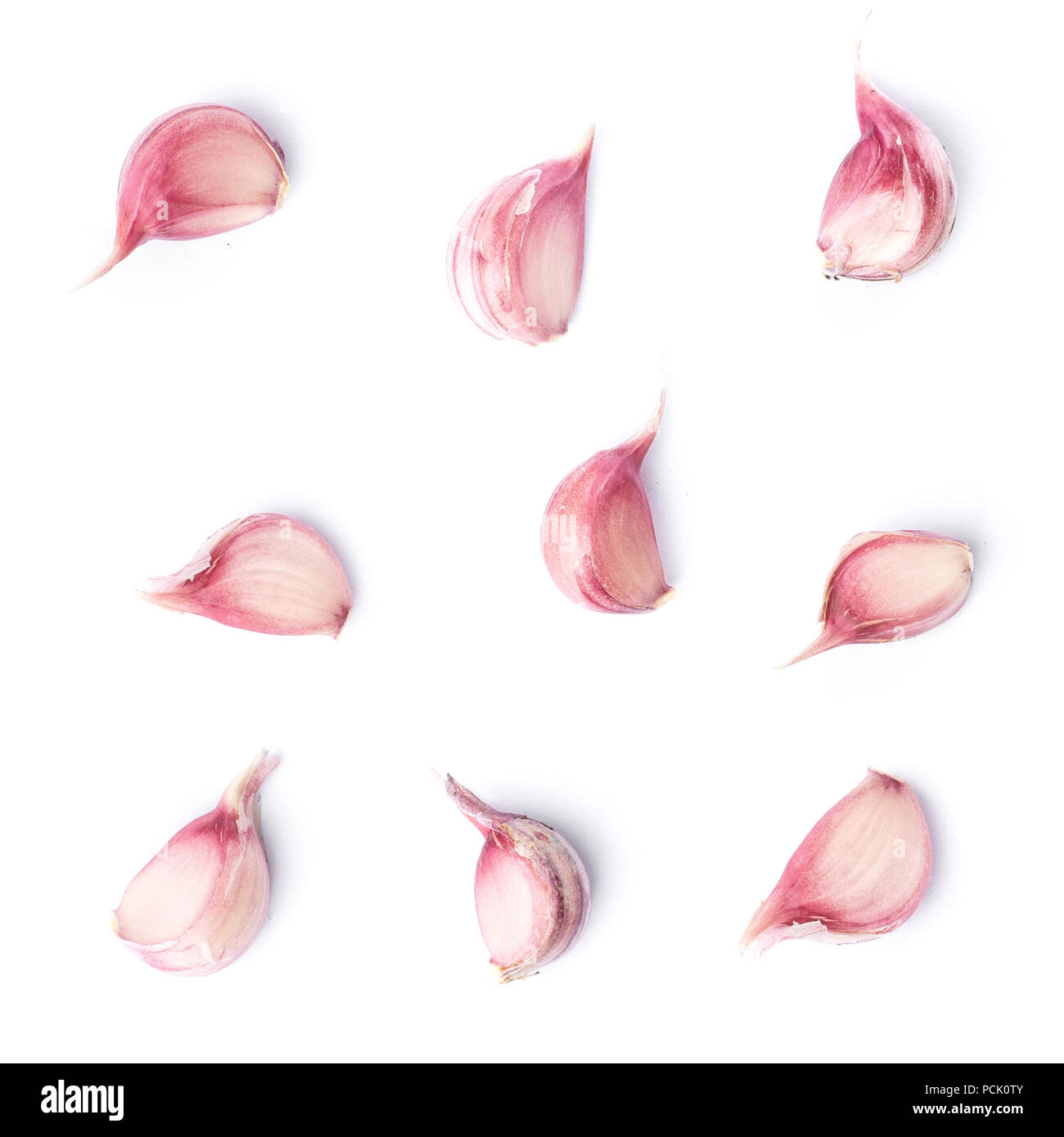 Nine garlic cloves isolated on white background Stock Photo