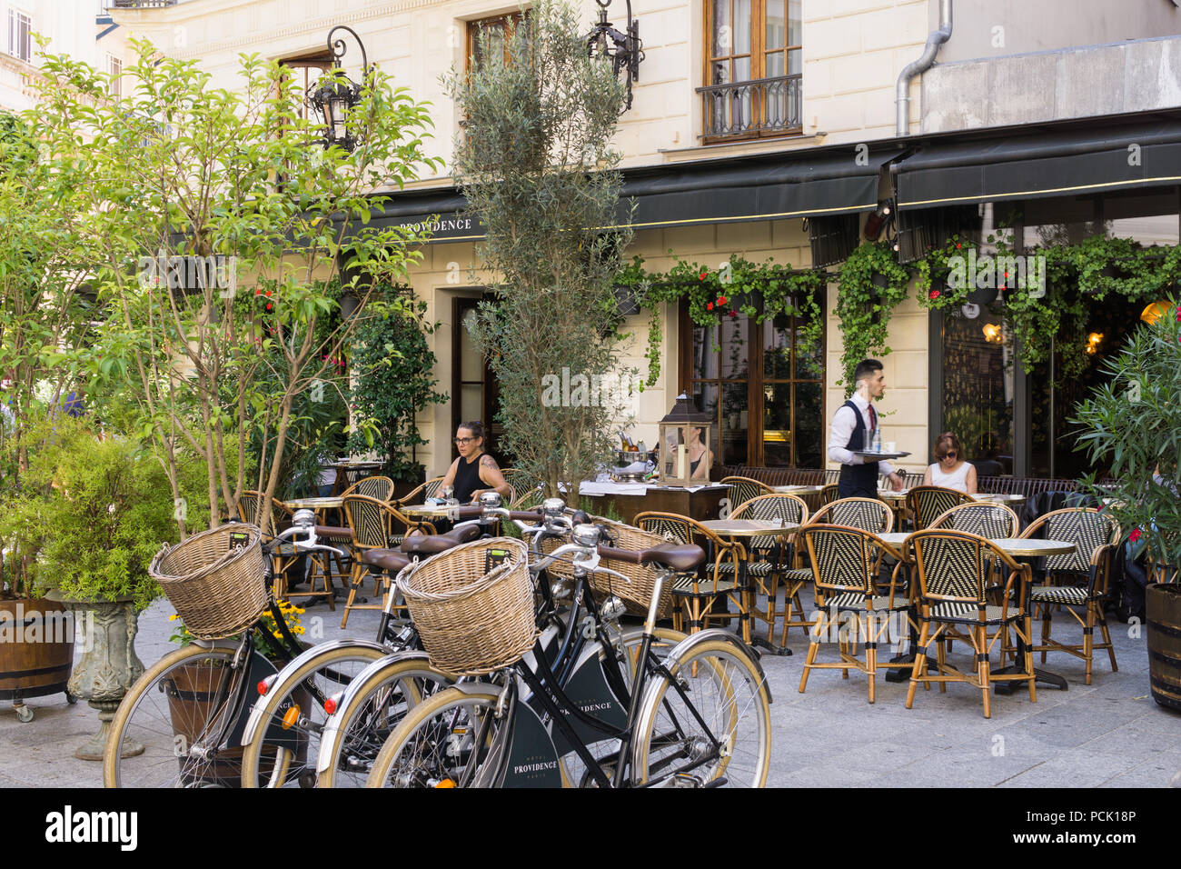 Paris cafe morning - a morning scene at a Paris cafe in the 10th arrondissement, France, Europe. Stock Photo