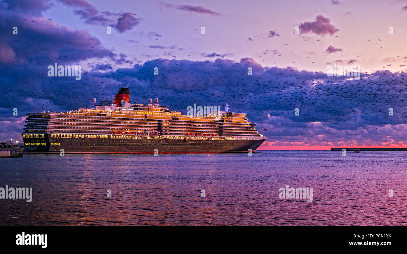 cruise ship at sunset Stock Photo - Alamy