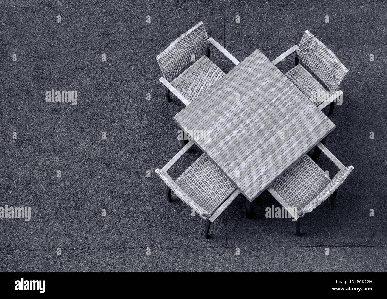 Empty table and chair Stock Photo - Alamy