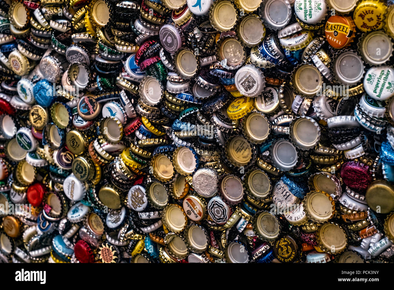 Malaga, Spain November 20, 2017. Background of beer bottle caps, a