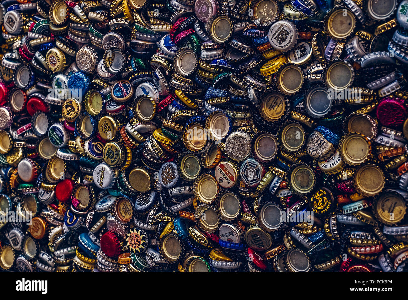 Malaga, Spain November 20, 2017. Background of beer bottle caps, a