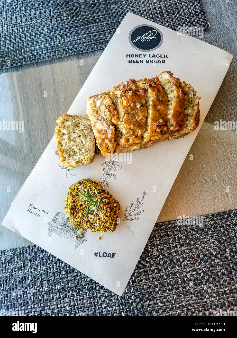 Honey lager beer bread at the Globe@YVR restaurant in Fairmont Vancouver Airport hotel in Richmond, BC, Canada. Stock Photo
