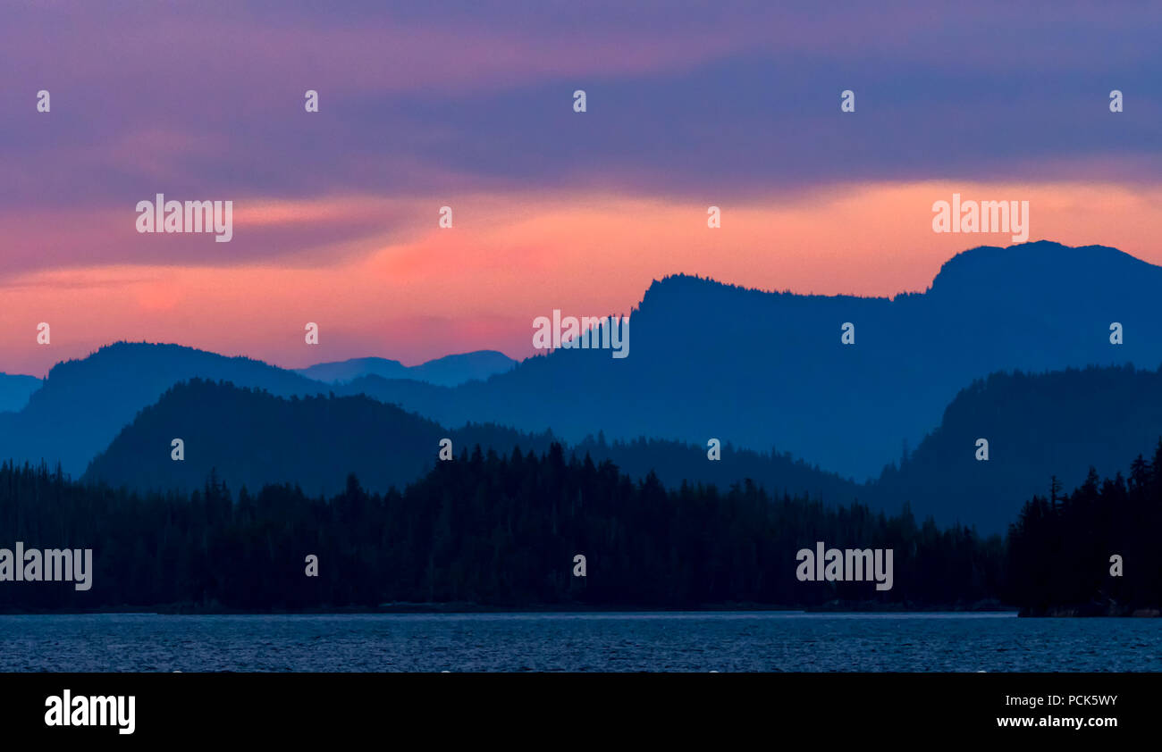 Twilight scene of ocean and mountains in Southeast Alaska, USA Stock ...