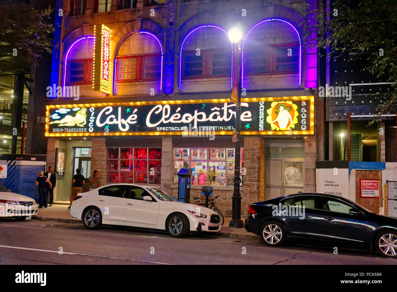 Café Cléopatre strip club on Rue St Laurent in Montreal at night Stock Photo