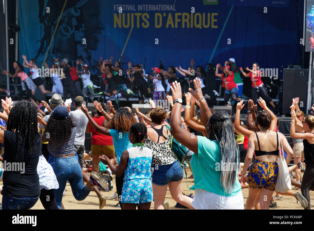 People dancing at the Festival Nuits D'Afrique in Montreal Stock Photo