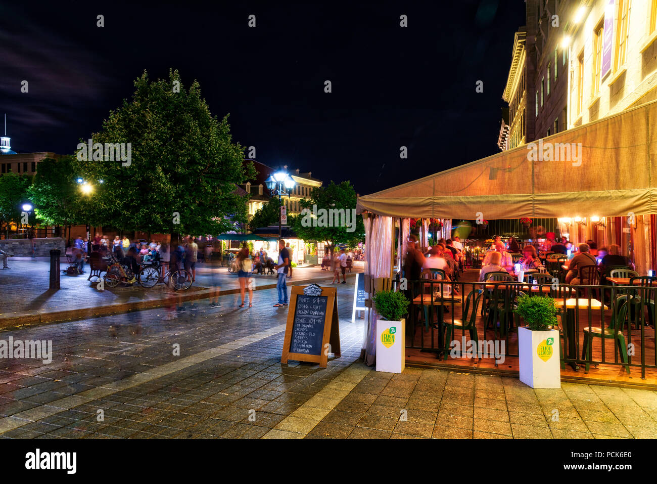 A busy restaurant terrace on Place Jacques Cartier in Montreal's Old Port district Stock Photo