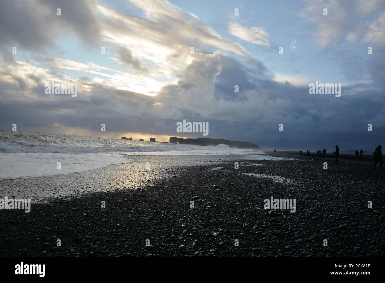 Sea Stacks, cliffs and caves at Black Sand Beach, Reynisfjara ...