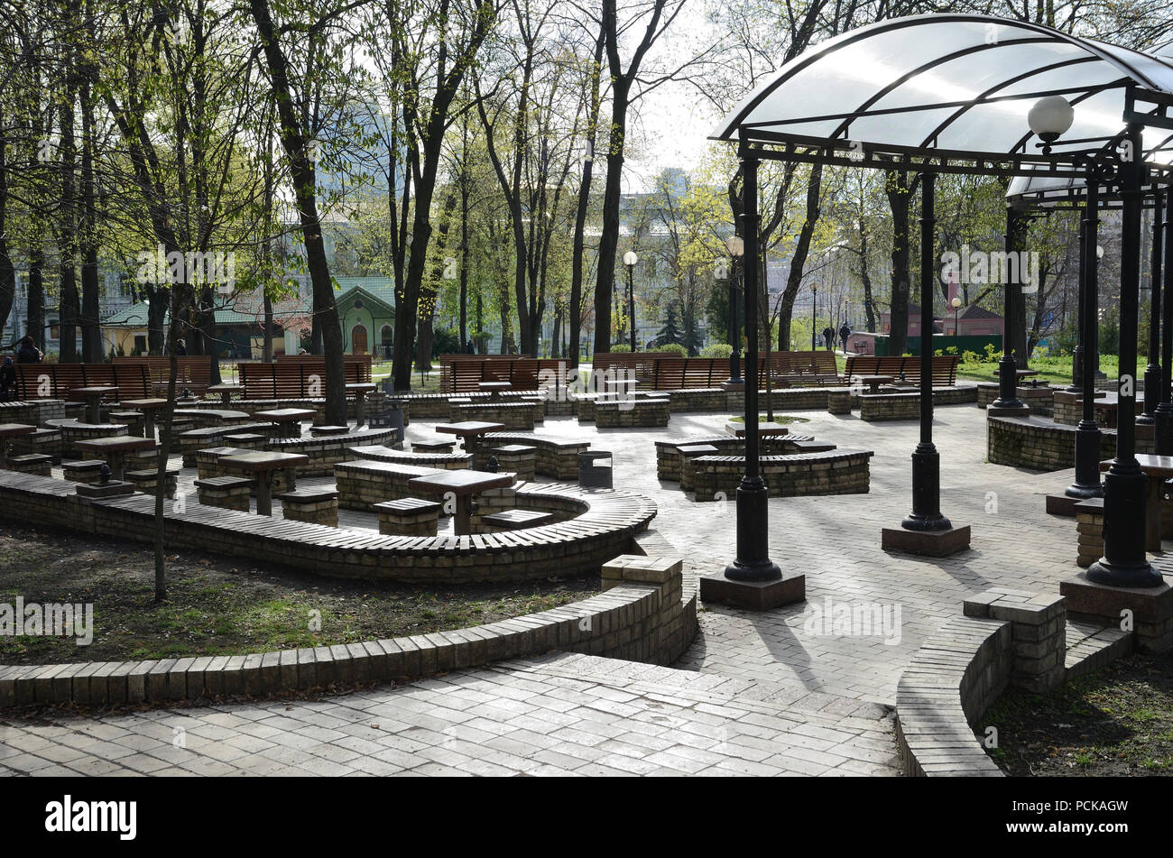 Sadochok is a playing field with many tables, chairs and canopy in the central park of the Ukrainian capital Kiev. Stock Photo