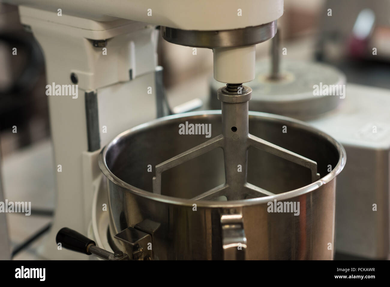 Whisking machine in commercial kitchen Stock Photo