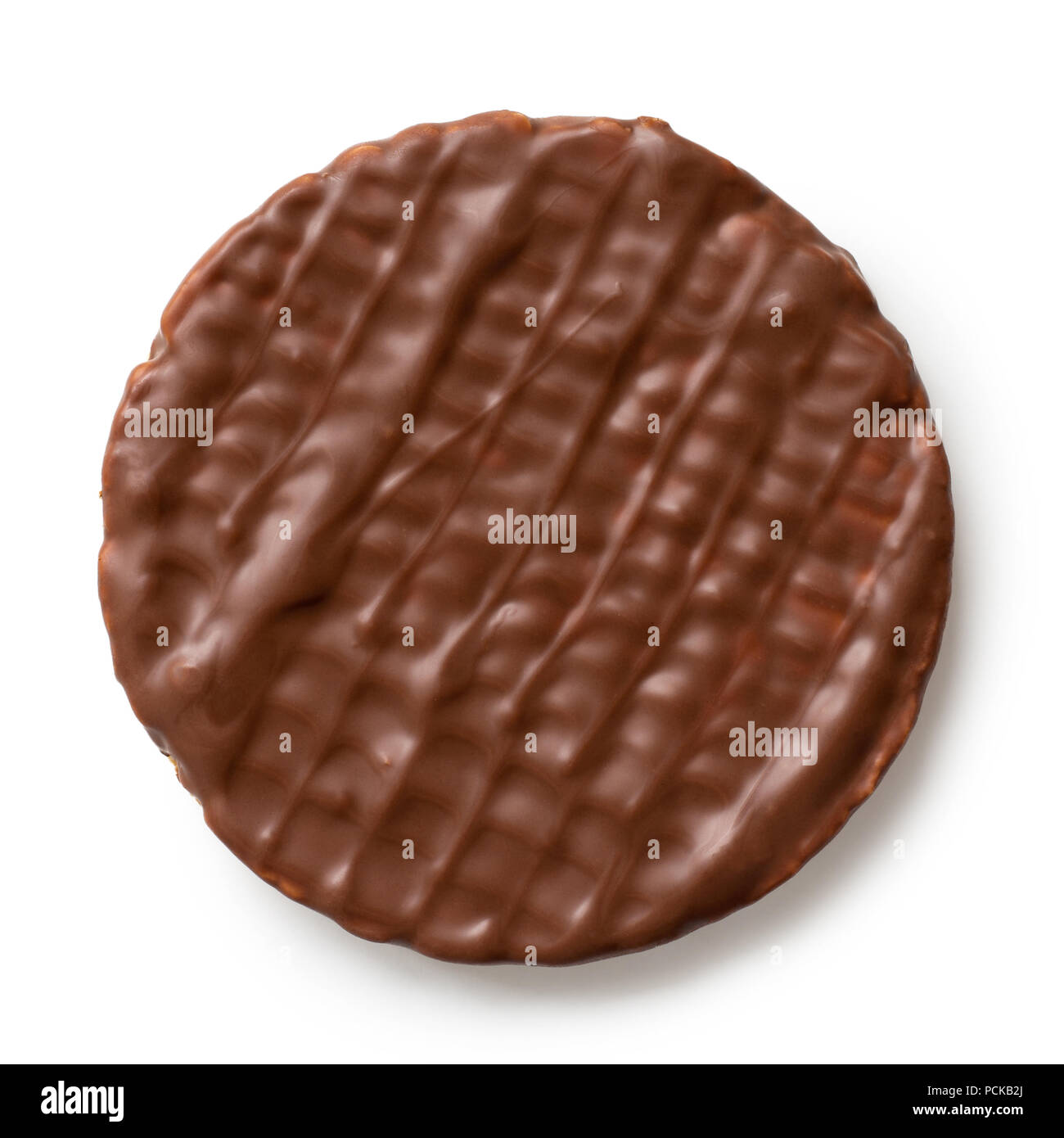 Whole chocolate rice cake isolated on white from above. Stock Photo