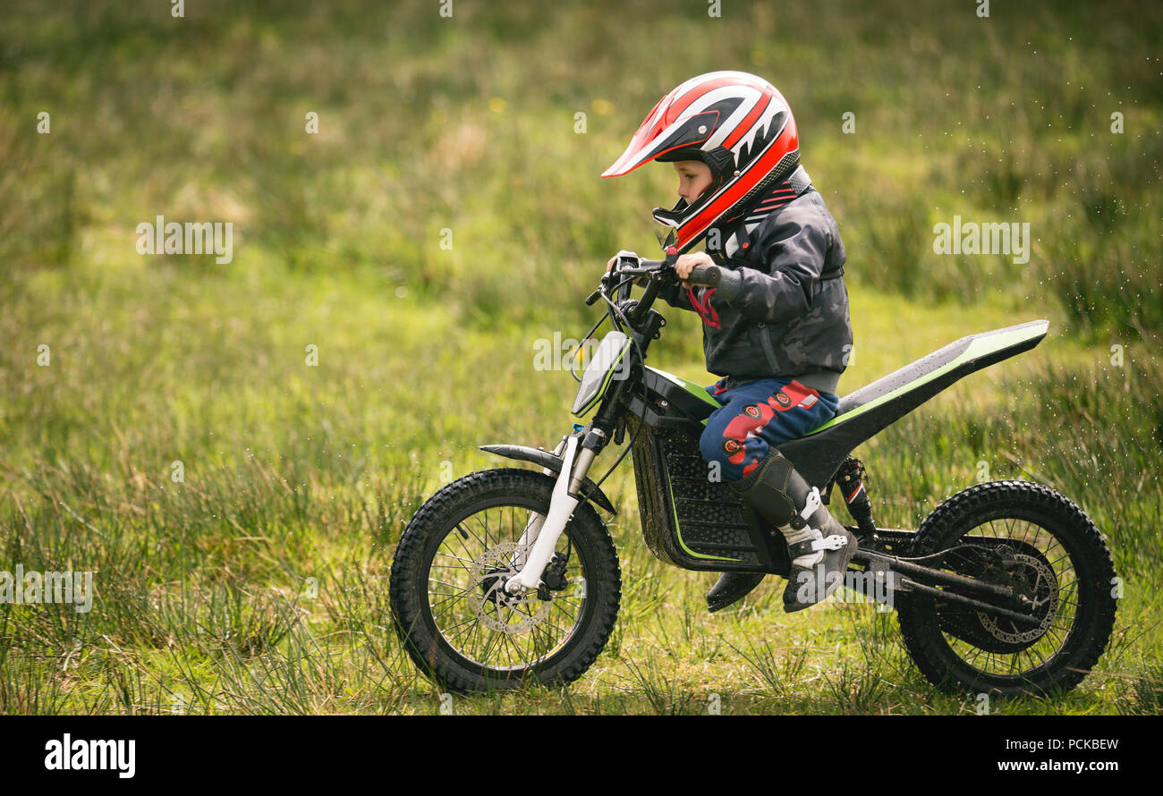Kid driving bike hi res stock photography and images Alamy