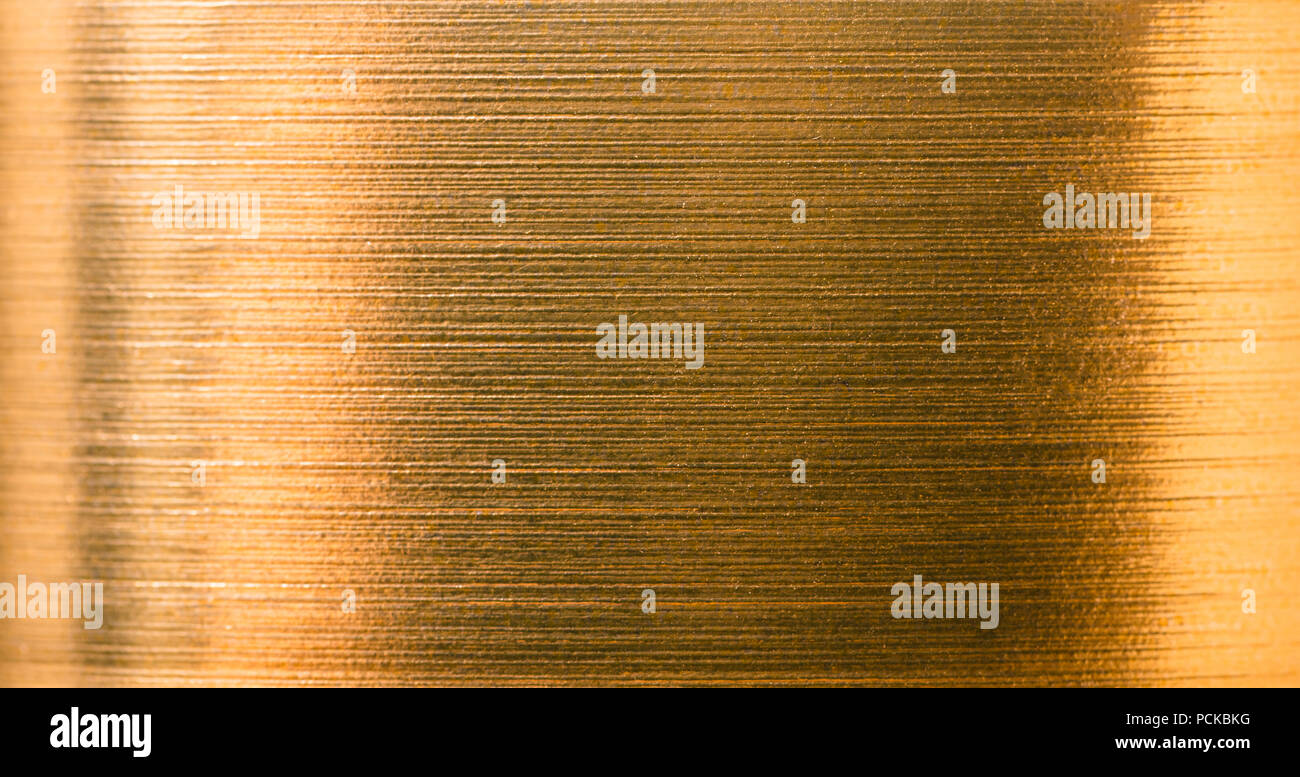 abstract background from a gold foil close-up texture Stock Photo