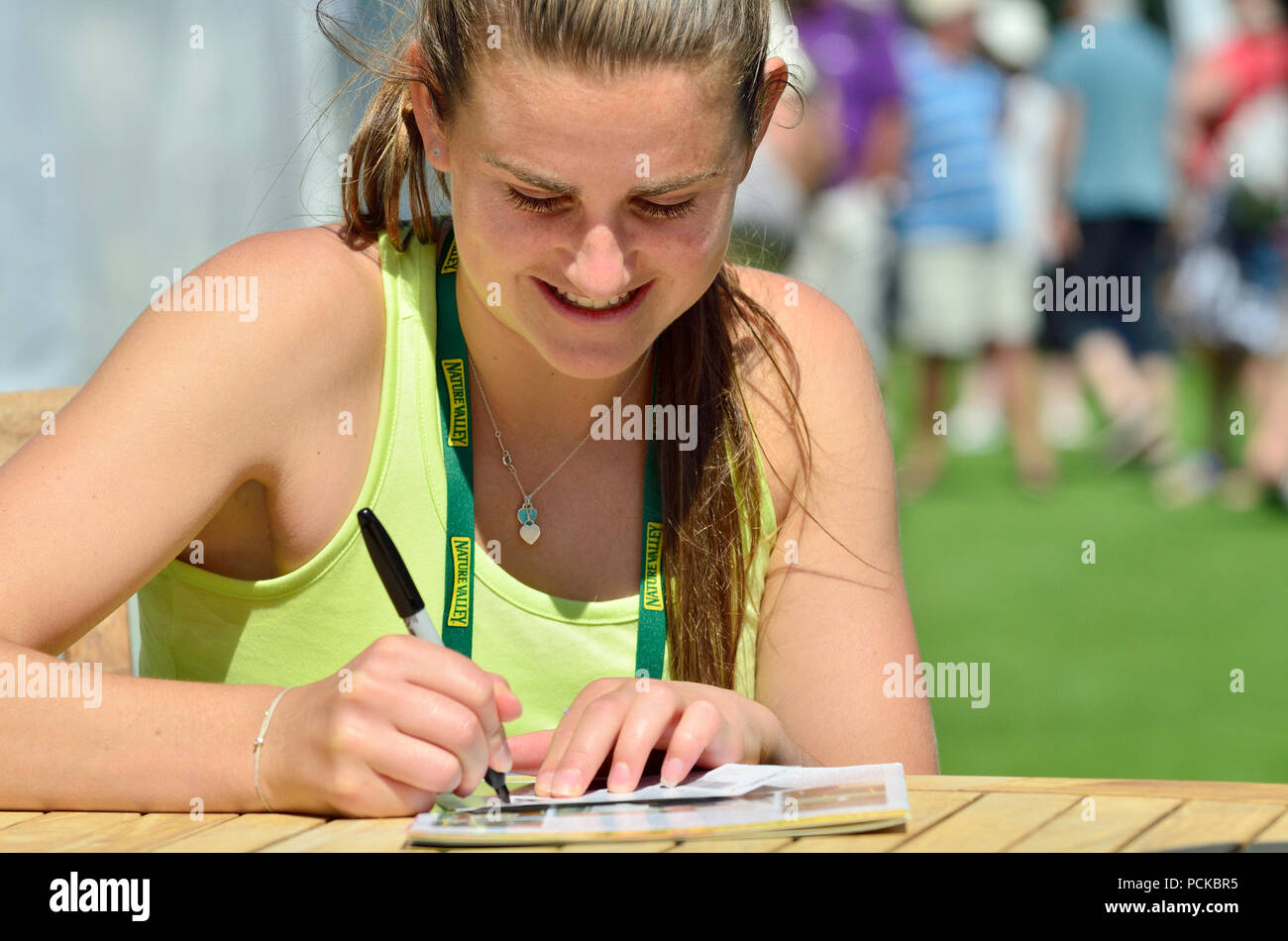 Katy Dunne (GB) signing autographs after a win in the first qualifying round of the Nature Valley International, Eastbourne 22nd June 2018 Stock Photo