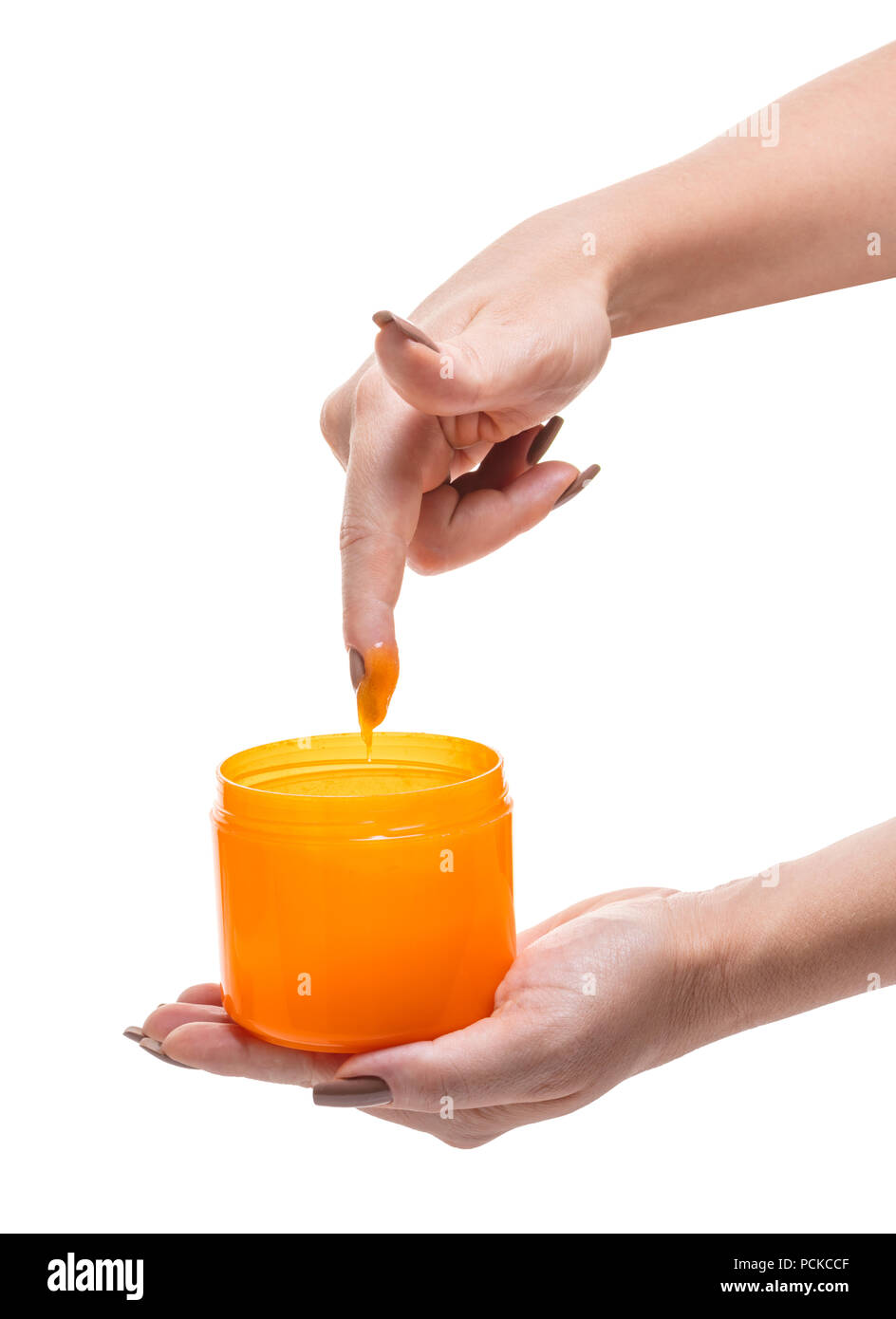 bank with cosmetic cream in hands on white background isolated Stock