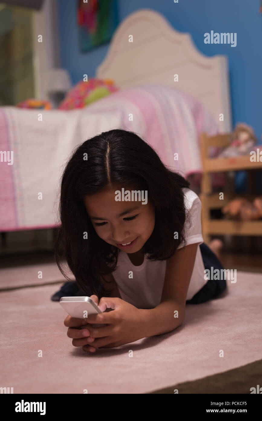 Happy girl holding mobile hi-res stock photography and images - Alamy