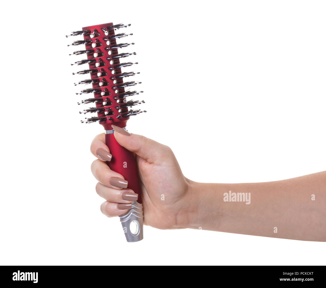 hair comb in female hand on white isolated background Stock Photo Alamy