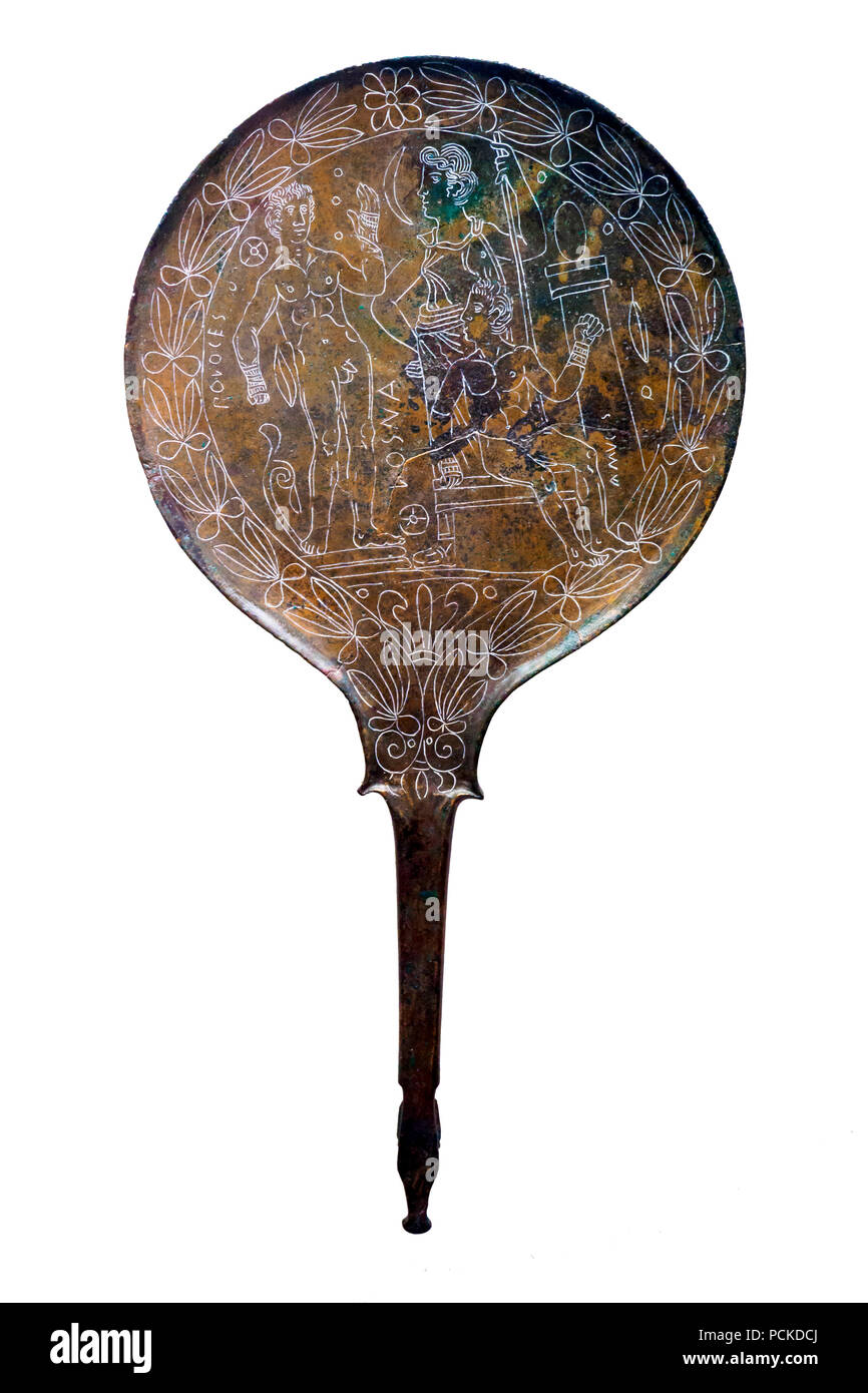 Bronze mirror. The decoration on the mirror reproduces the scene before the contest between Amykos and Pollux in the presence of Luna (Losna). Palestrina end of the 4th century BC - National Etruscan Museum of Villa Giulia - Rome, Italy Stock Photo