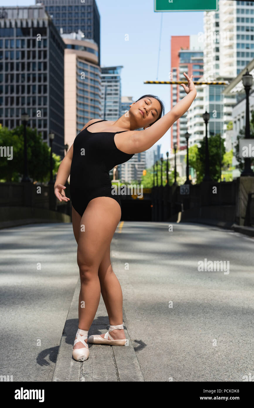 Female ballet dancer dancing on the street Stock Photo - Alamy