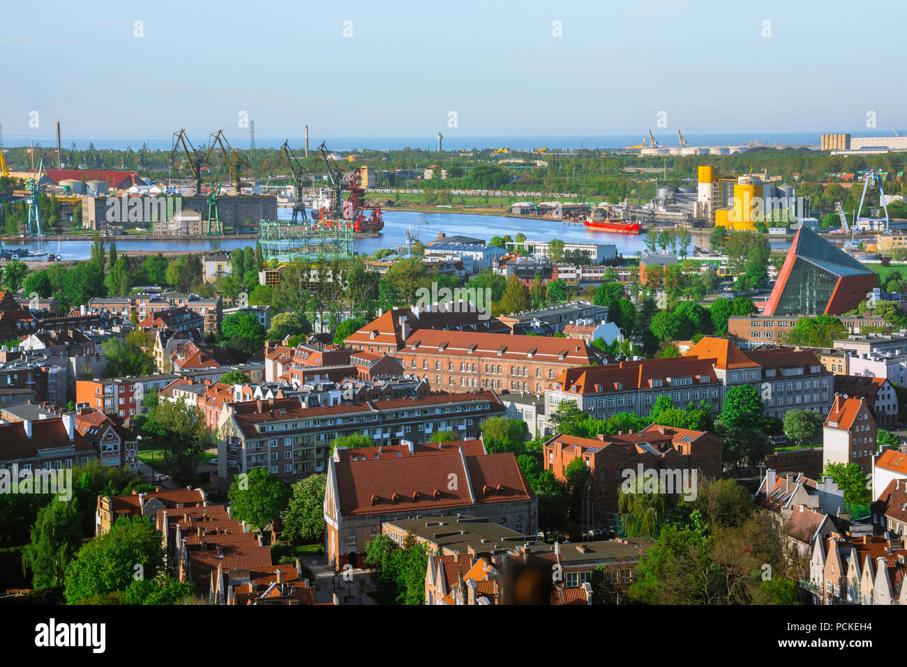 Gdansk cityscape, aerial view of the northern edge of the city of Gdansk  with the cranes of the Nowy Port shipyard in the distance, Pomerania,  Poland Stock Photo - Alamy