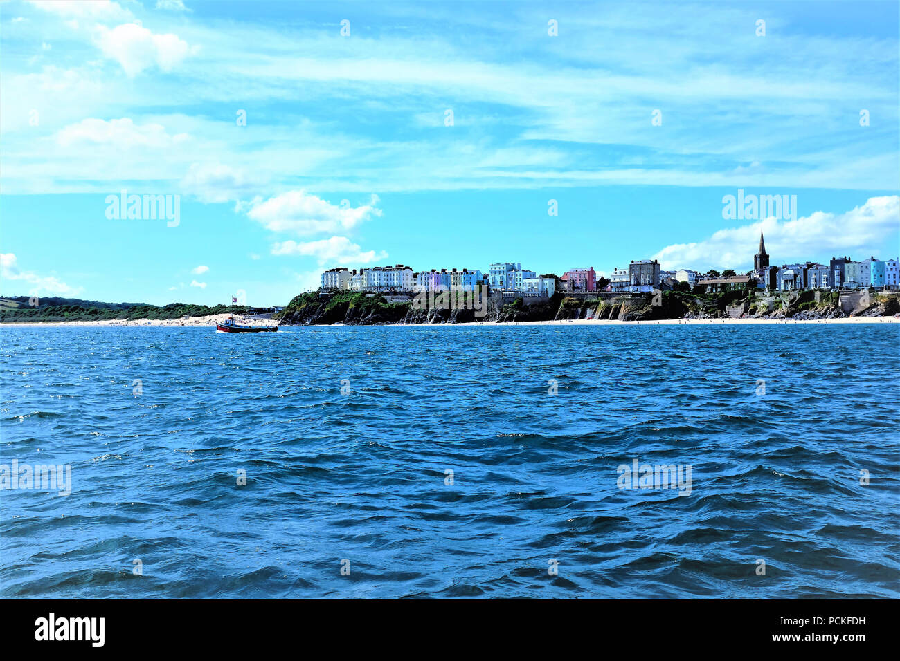 Tenby, Pembrokeshire, South Wales, UK. July 24, 2018.  The picturesque town seafront taken from the Caldey Island ferry of Tenby in South Wales, UK. Stock Photo