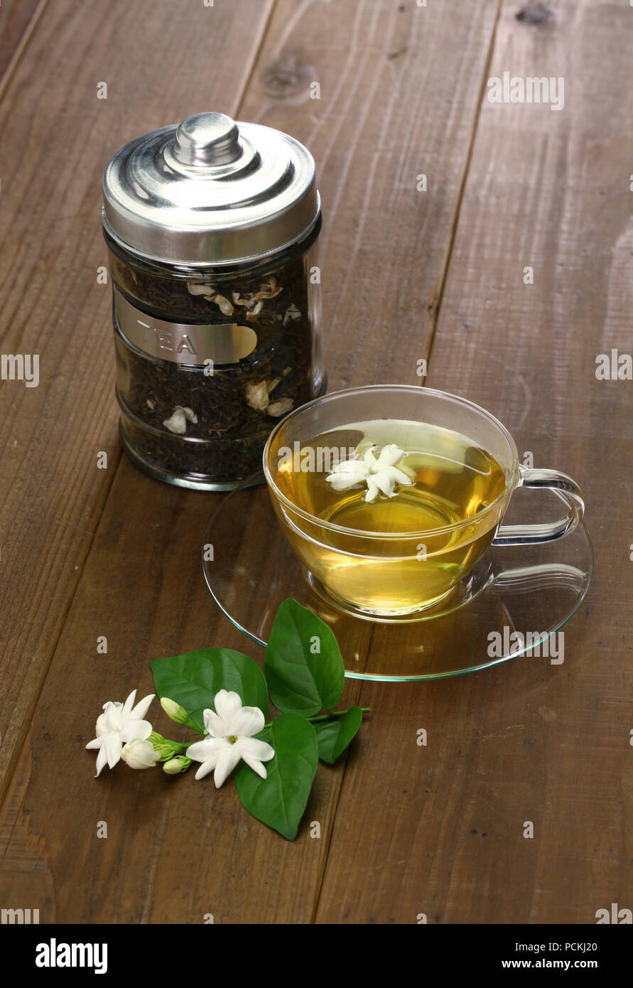 making jasmine tea, green tea with arabian jasmine flower Stock Photo Alamy