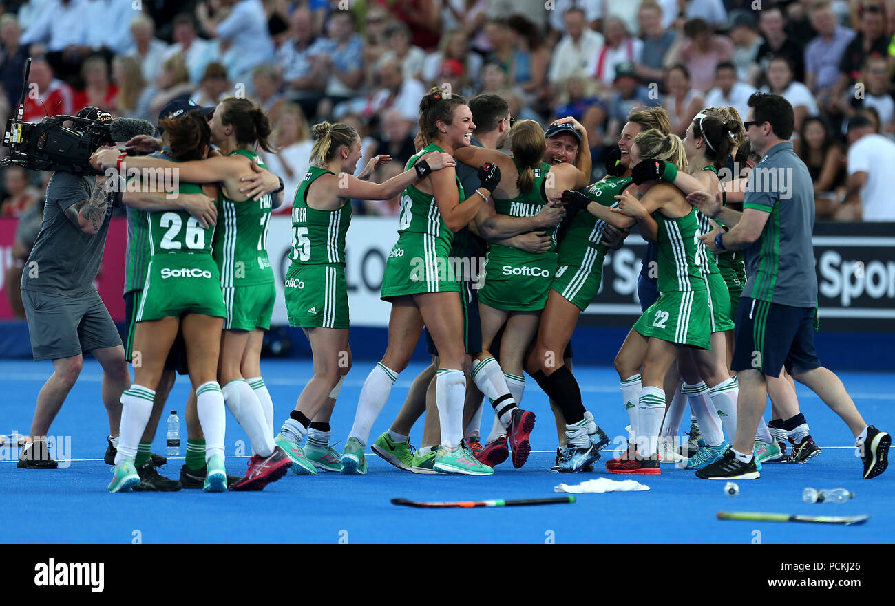 Ireland's Graham Shaw (centre) celebrates after Chloe Watkins scoring the winning goal during the shoot out Quarter Final at The Lee Valley Hockey and Tennis Centre, London. PRESS ASSOCIATION Photo, Picture date: Thursday August 2, 2018. Photo credit should read: Steven Paston/PA Wire Stock Photo
