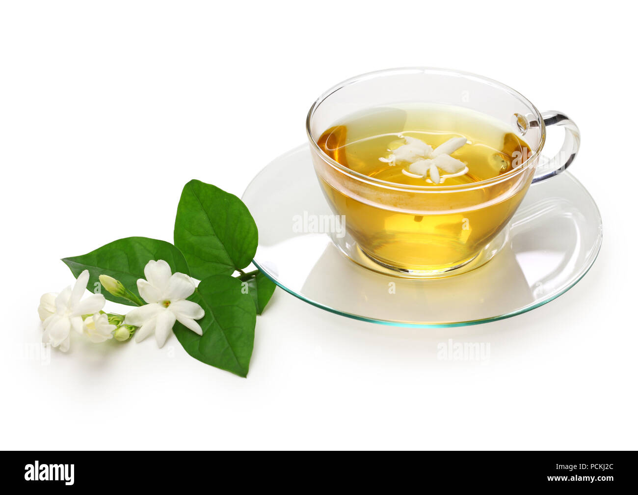 homemade jasmine tea and arabian jasmine flower isolated on white ...