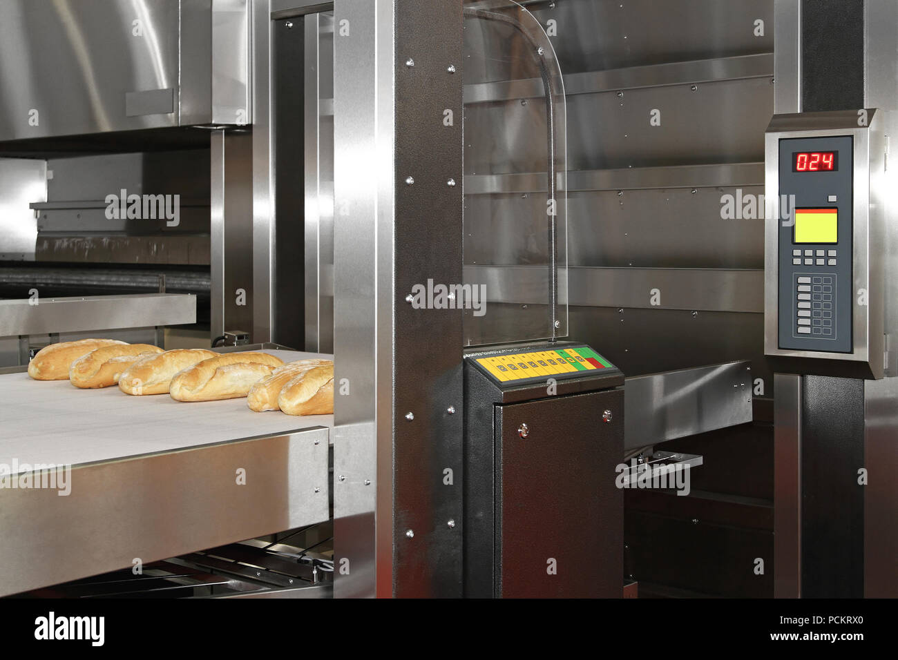 Commercial bread baking oven with conveyer belt Stock Photo Alamy