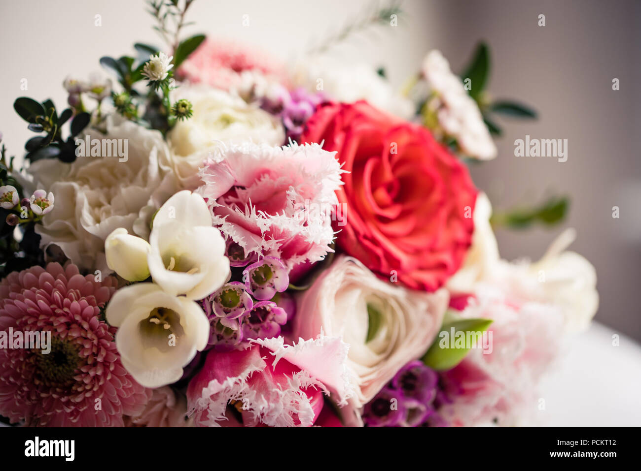 Wedding bouquet Beautiful flowers in bride's hands in a white dress