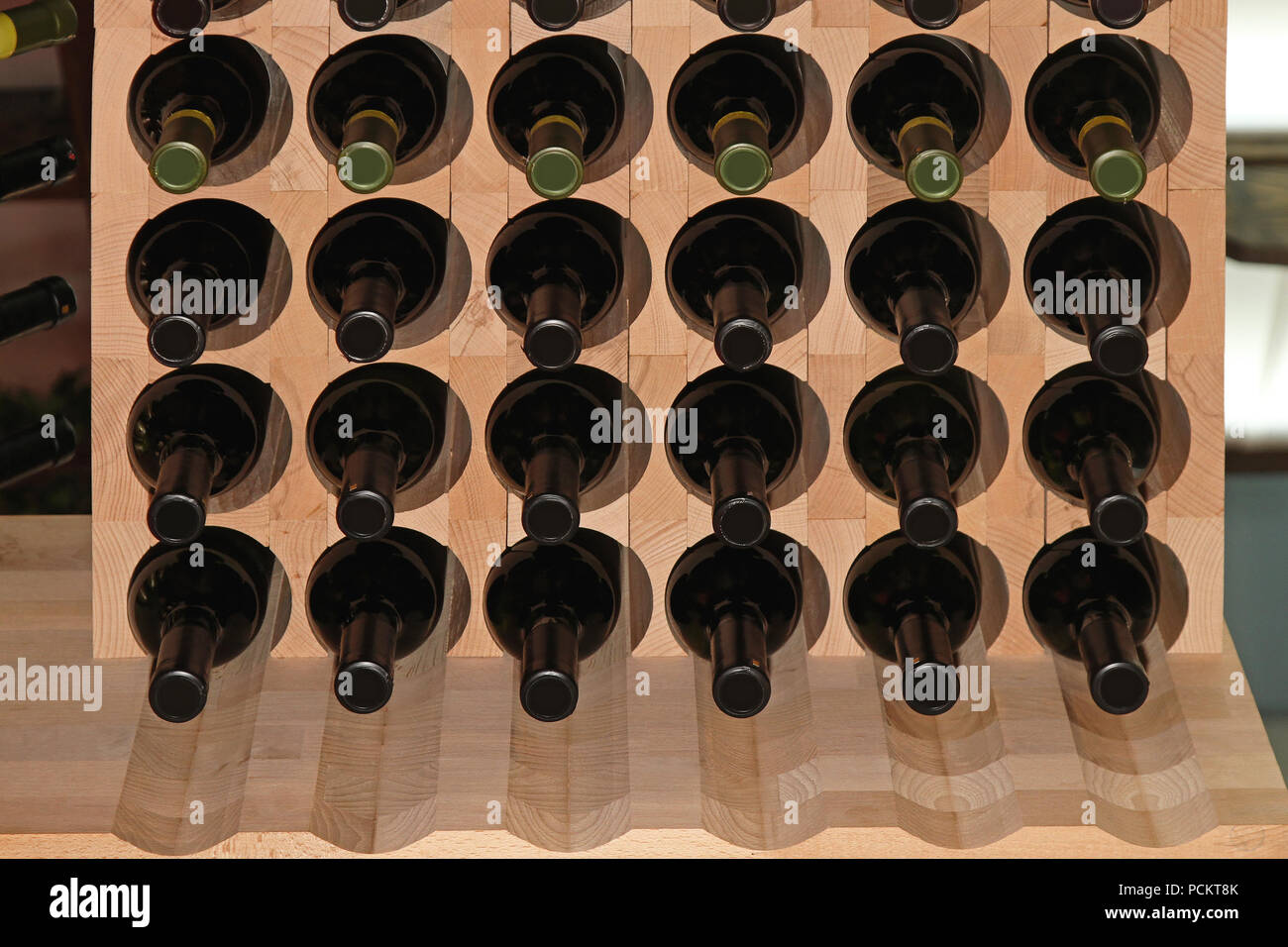 Wooden shelf for wine bottles storage Stock Photo Alamy