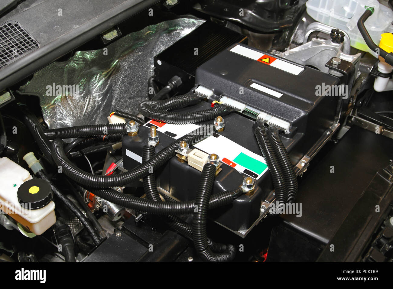 Under the hood of electric car Stock Photo Alamy