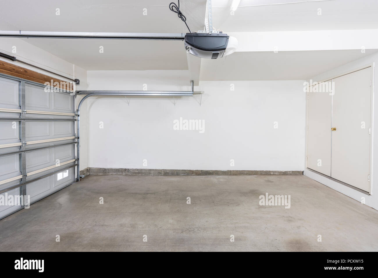 Completely empty two car suburban garage interior. Stock Photo
