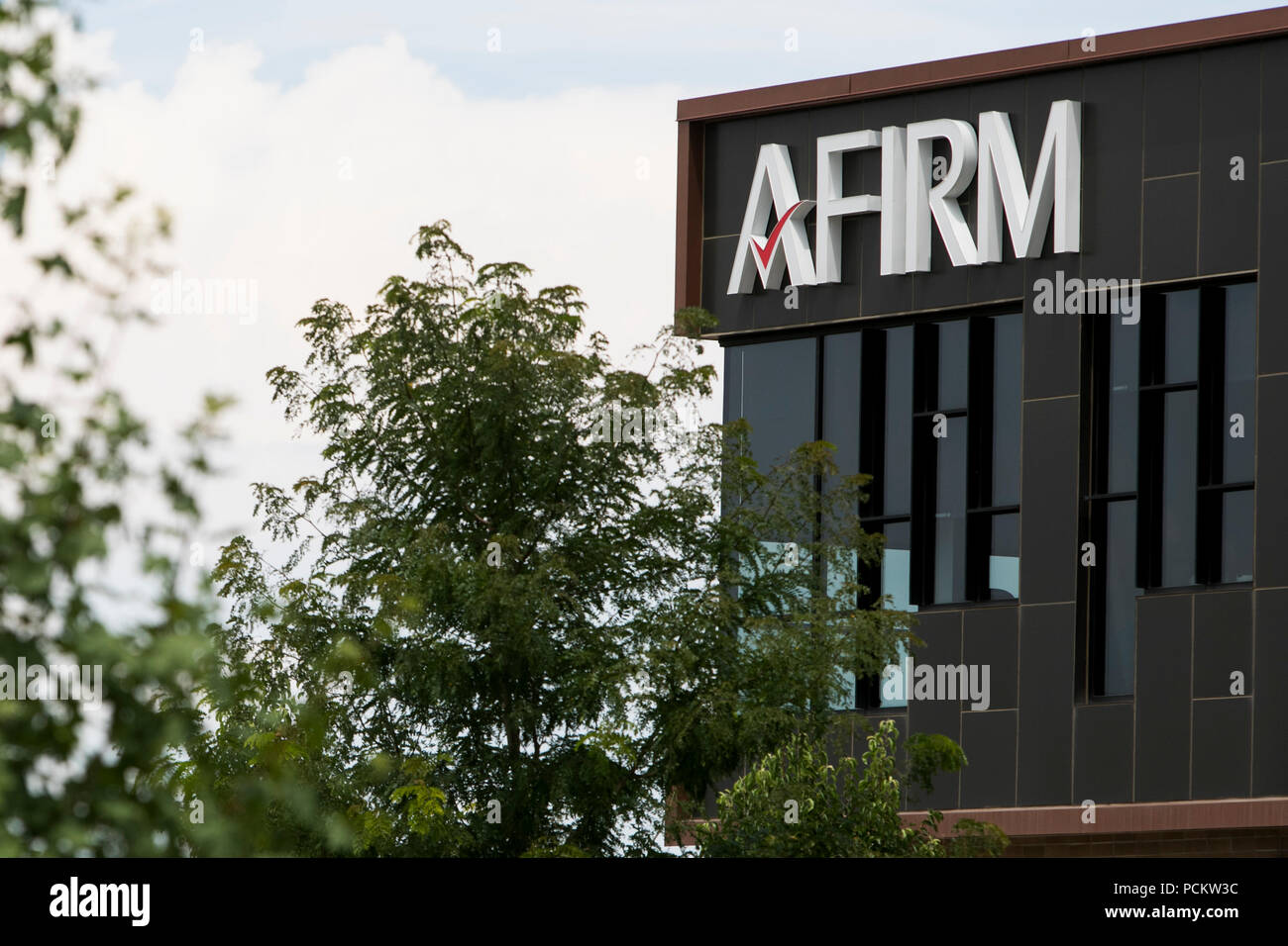 A logo sign outside of the headquarters of the Afirm Solutions in Fort Collins, Colorado, on July 21, 2018. Stock Photo