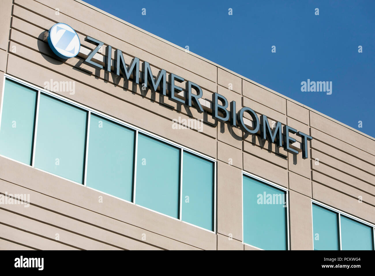 A logo sign outside of a facility occupied by Zimmer Biomet in Westminster, Colorado on July 21, 2018. Stock Photo