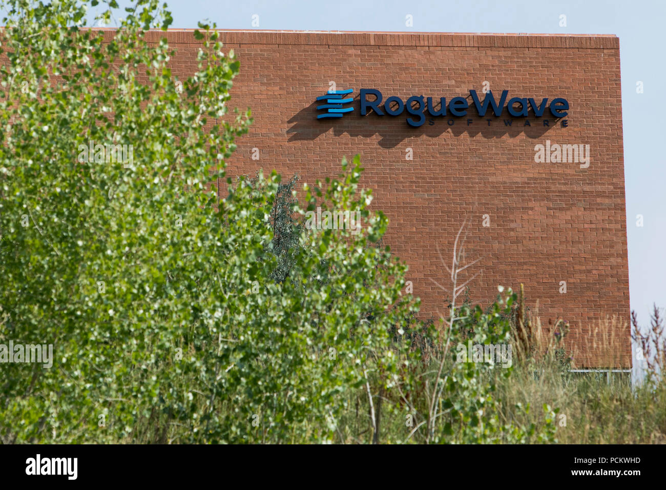 A logo sign outside of a facility occupied by Rogue Wave Software in Louisville, Colorado, on July 21, 2018. Stock Photo
