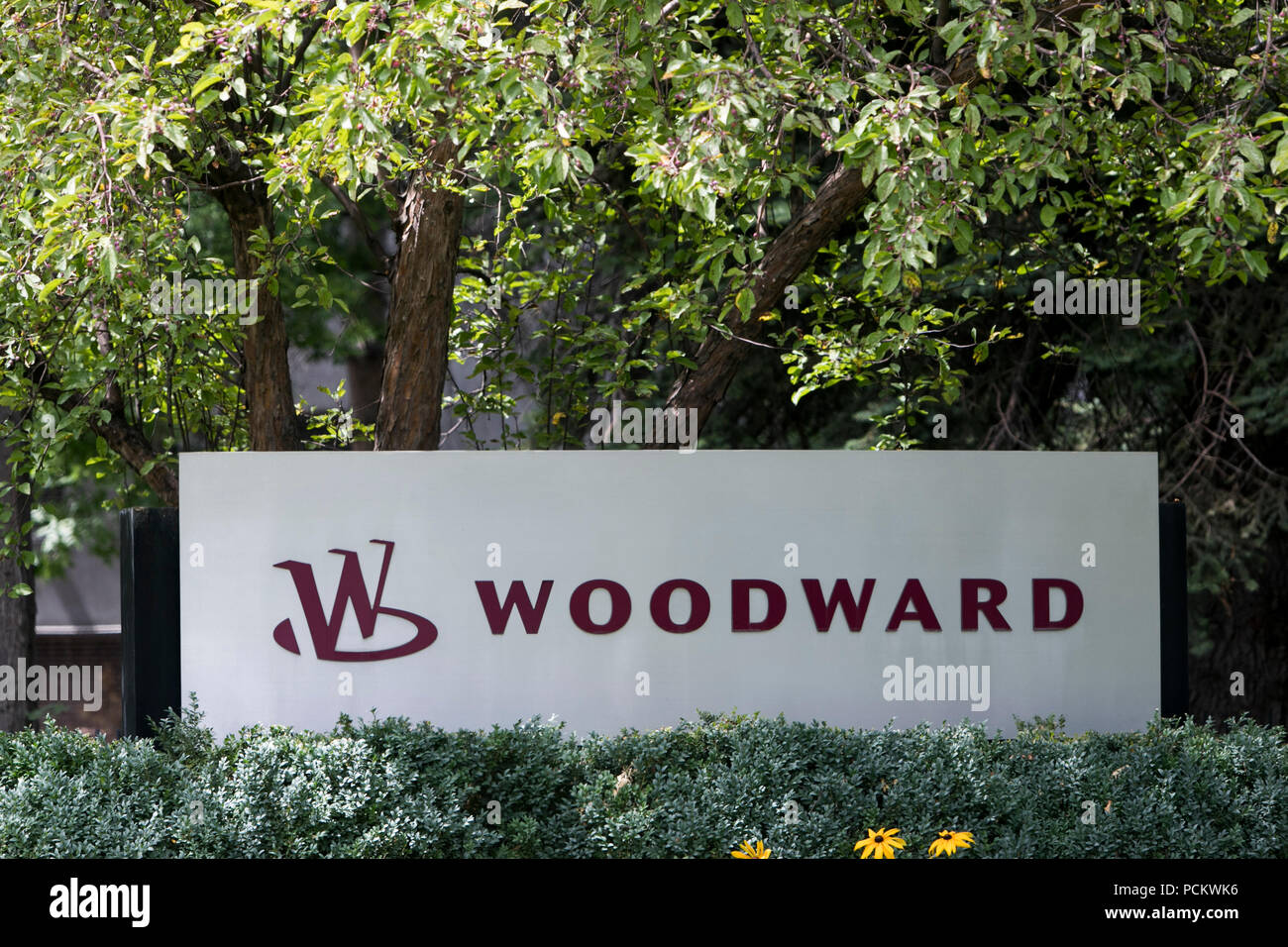 A logo sign outside of a facility occupied by Woodward, Inc., in Fort Collins, Colorado, on July