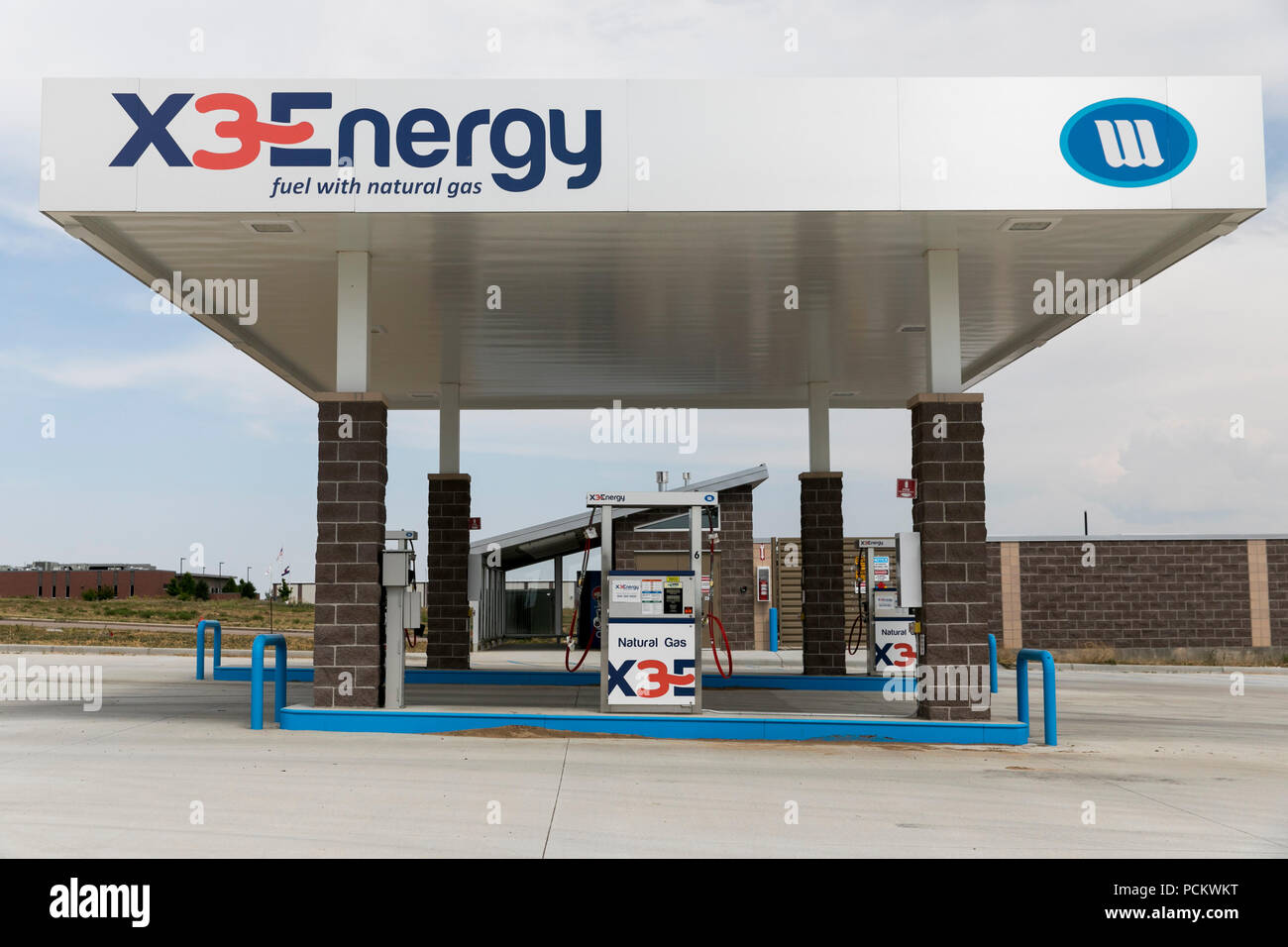 A logo sign outside of a X3Energy and Ward Alternative Energy natural gas fueling station in Greely, Colorado, on July 21, 2018. Stock Photo