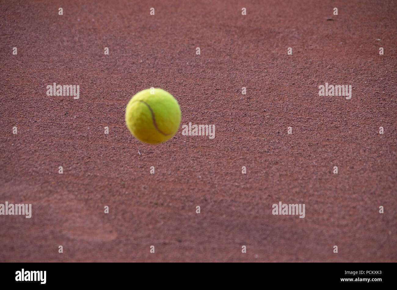Tennis Ball bouncing on court Stock Photo Alamy