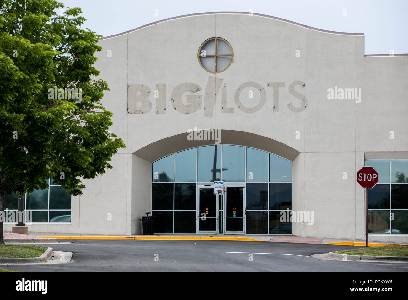 The faded outline of a logo sign outside of a closed Big Lots retail store location in Lakewood, Colorado, on July 22, 2018. Stock Photo