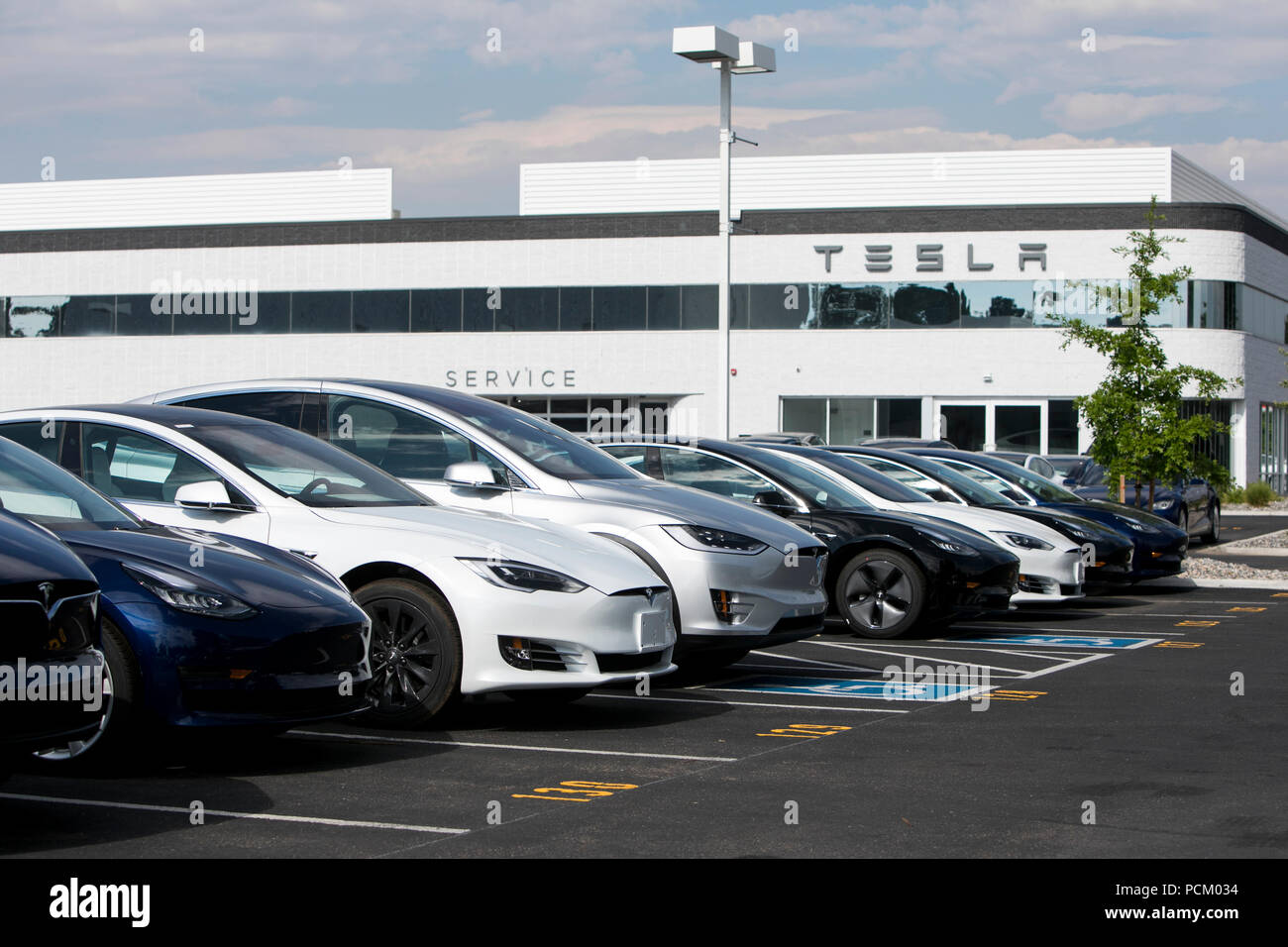 Tesla Model S, Model 3 and Model X electric vehicles at a Tesla Store location in Littleton, Colorado, on July 22, 2018. Stock Photo
