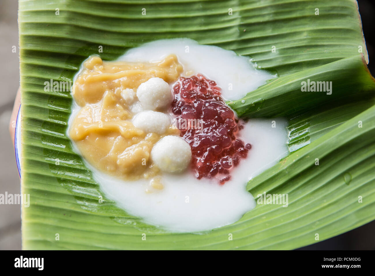 bubur traditional. indonesian porridge made from glutinous rice flour and coconut milk Stock