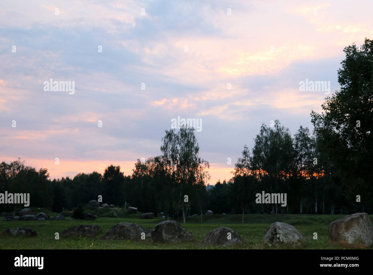 Sunset in the park of stones in the summer, in the spring. Background Stock Photo