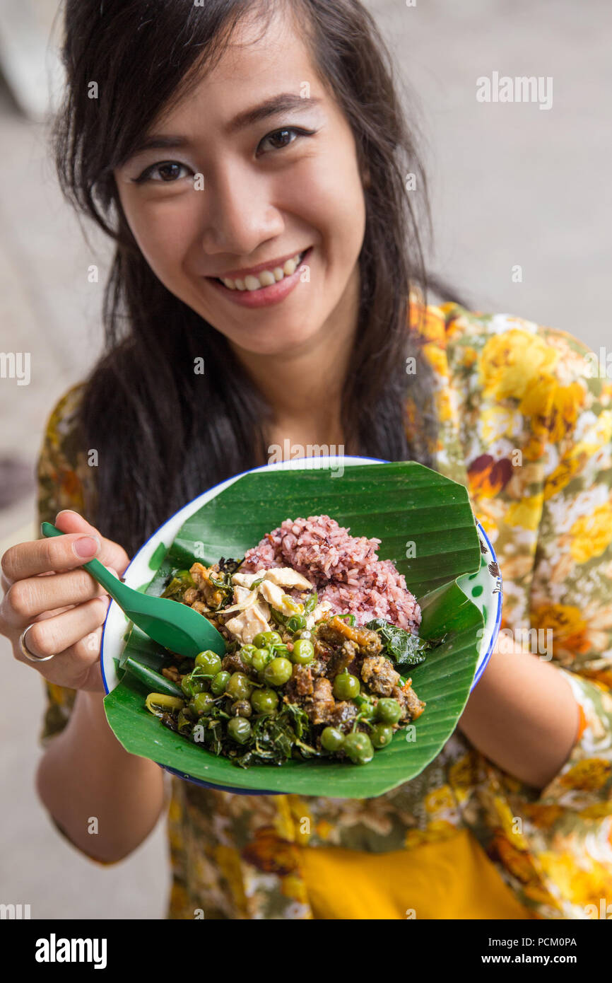 red or brown rice in traditional javanese indonesian culinary served ...