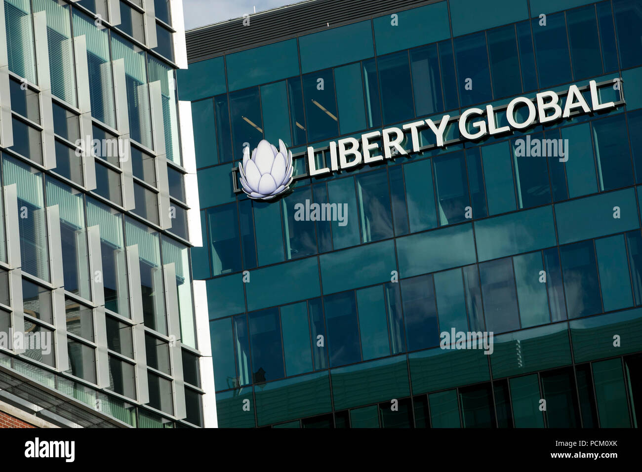 A logo sign outside of a facility occupied by Liberty Global in Denver
