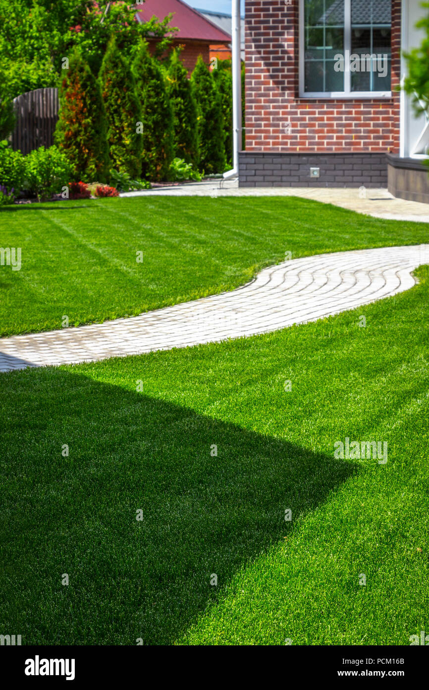 Beautiful evenly trimmed lawn hi-res stock photography and images - Alamy